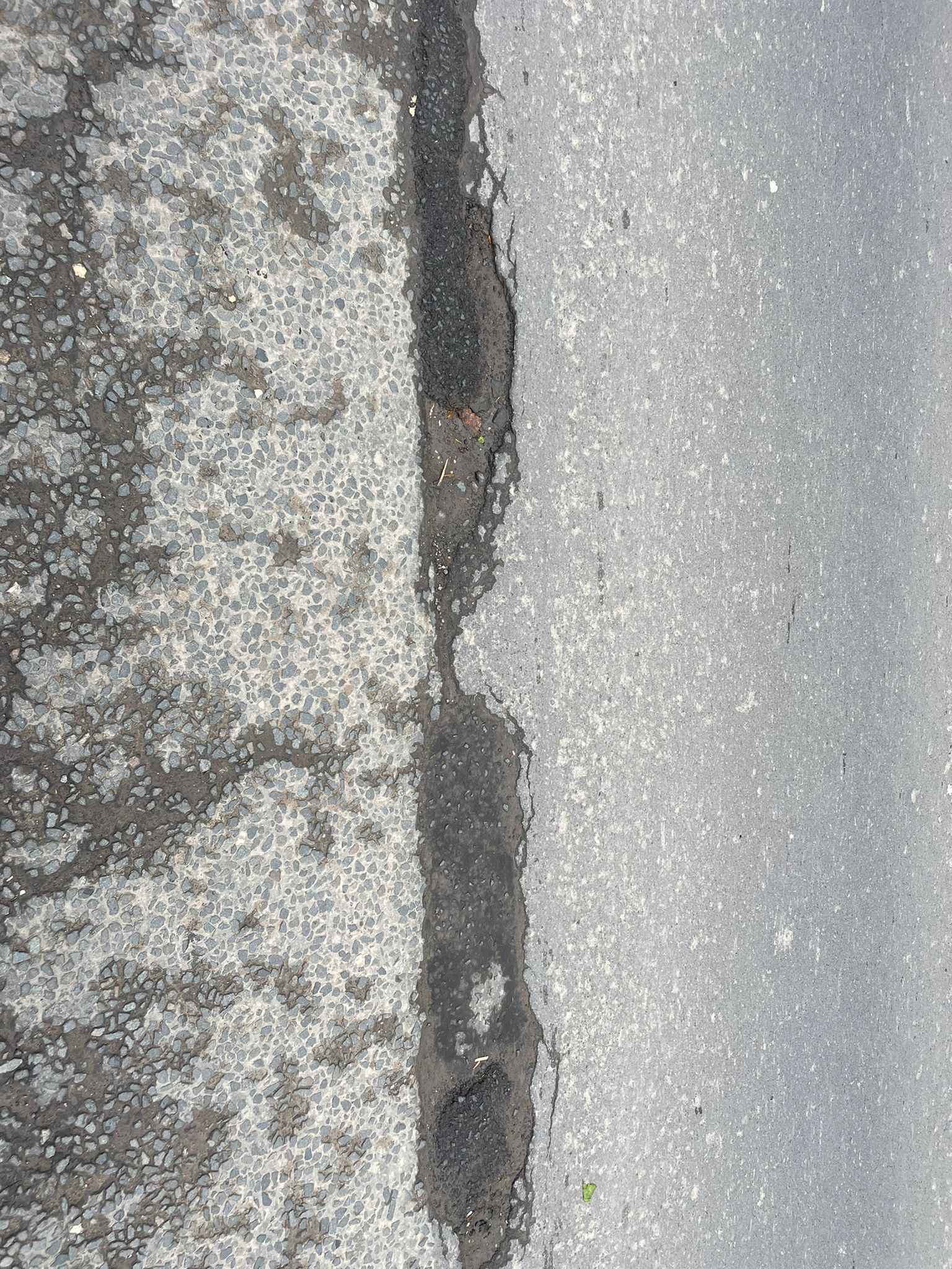 Deep cracking at road edge on Hamilton Road